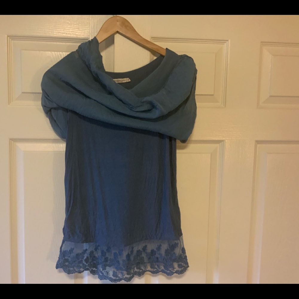 Silk top with a lace bottom lining.